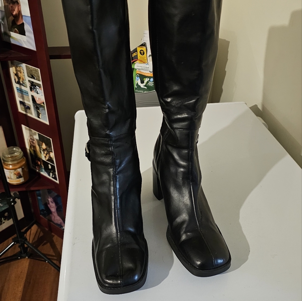Knee length black boots